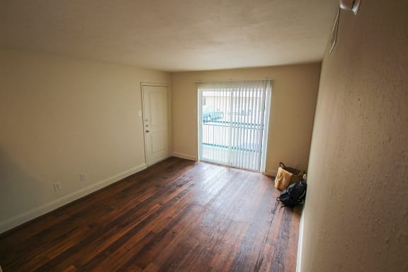 This is a photo of the vinyl hardwood flooring in the dining room of a 558 square foot 1 bedroom apartment at The Summit at Midtown Apartments in Dallas, TX.