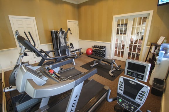 This is a photo of the 24-hour finess center with free weights at Washington Park Apartments in Centerville, OH.
