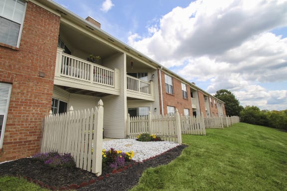 This is a photo of private patios and balconies at Washington Park Apartments in Centerville, OH.