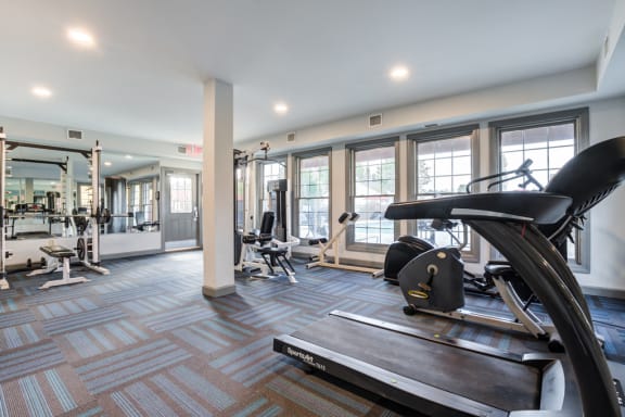 Fitness center with treadmills and various weight machines