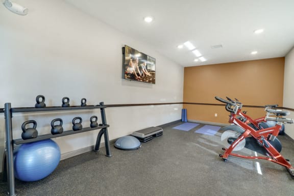Yoga and spin studio with on-demand fitness classes at North Pointe Villas luxury apartments in north lincoln NE