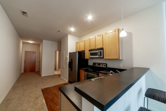 Fully Furnished Kitchen With Stainless Steel Appliances at 26 West, Managed by Buckingham Urban Living, Indianapolis, IN, 46204