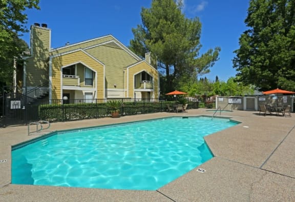 Pool with lounge chairs | Riverstone apts in Sacramento, CA 95831