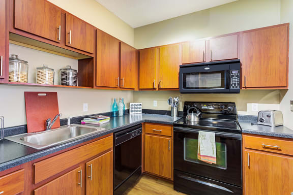 microwave in kitchen at Uptown Lake Apartments, Minneapolis