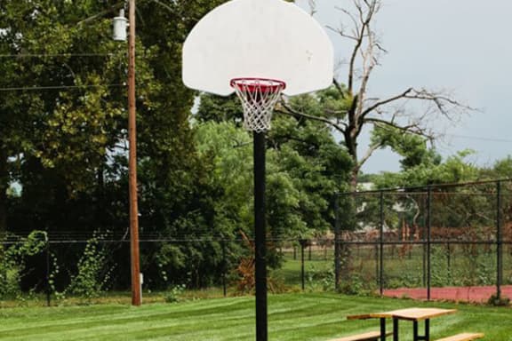 basketball court at Woodman Park apartments
