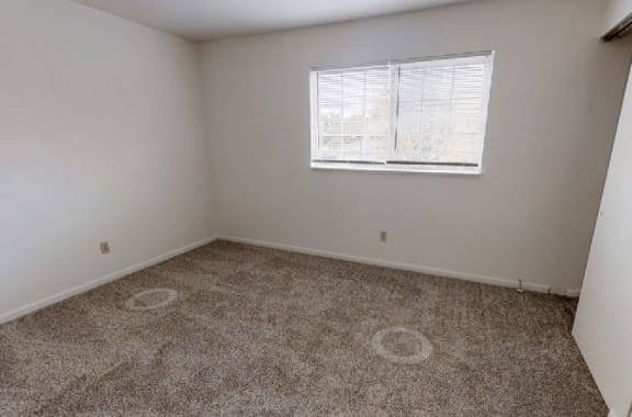 Carpeted Living Area Carpeted Living Area at Arbor Pointe Townhomes, Battle Creek, MI