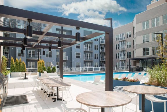 Rooftop pool, sundeck and lounge at The Whit in Indianapolis, IN 46204