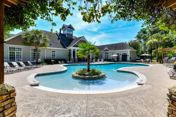 Revitalizing Pool with Relaxation Space and Seating Area at Legends at Charleston Park Apartments, North Charleston, SC, 29420