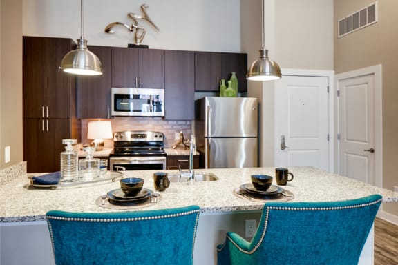 Kitchen and dining at these luxury apartments in Hanover MD