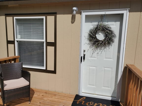 welcoming front door with wreath at forest vista mobile homes iin la porte texas at Forest Vista, La Porte, TX