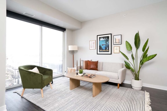 a living room with a couch and a chair