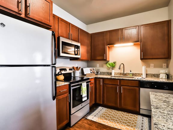 Modular kitchen with essentials at Residences at The Streets of St. Charles, Missouri, 63303