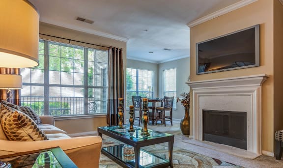 Living Room with Fireplace at Bridford Lake Apartments, Greensboro, 27407