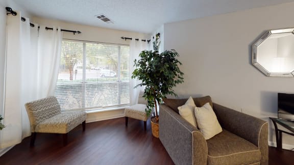 Living Room with Balcony Access at University Ridge Apartments, North Carolina