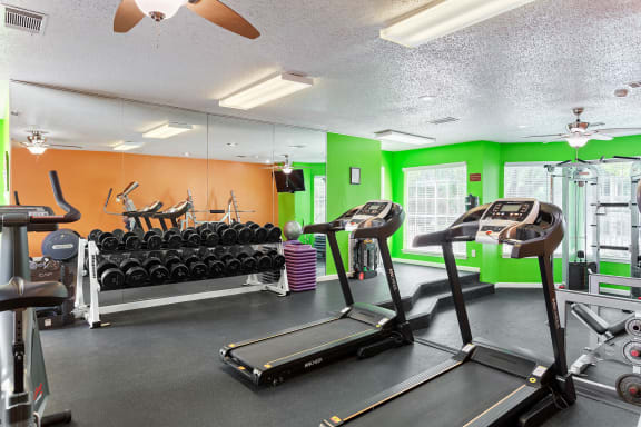 Fitness Center with Free Weights at The Willows on Rosemeade, Texas