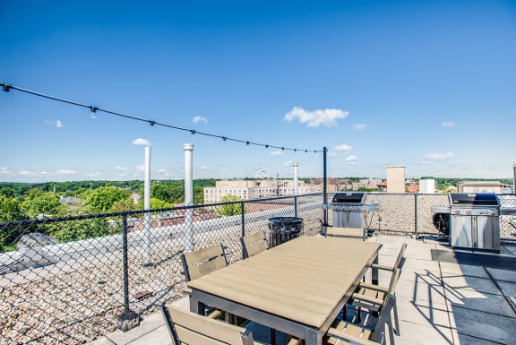 Rooftop deck with tables and seating at 2100 Connecticut, Washington, Washington