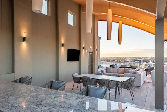 Outdoor Grill With Intimate Seating Area at Encore at Boulevard One, Colorado, 80230