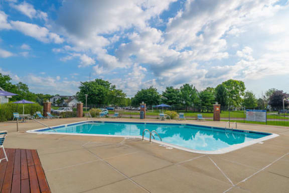Refreshing Pool With Large Sundeck at Arbor Lakes Apartments in Elkhart, IN