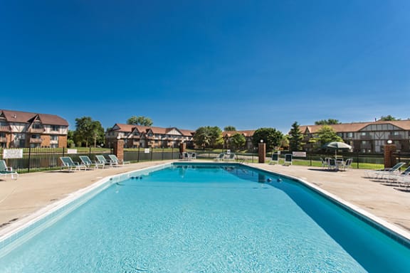 Lakeside Outdoor Swimming Pool with Spacious Sundeck at Bavarian Village Apartments, Indiana