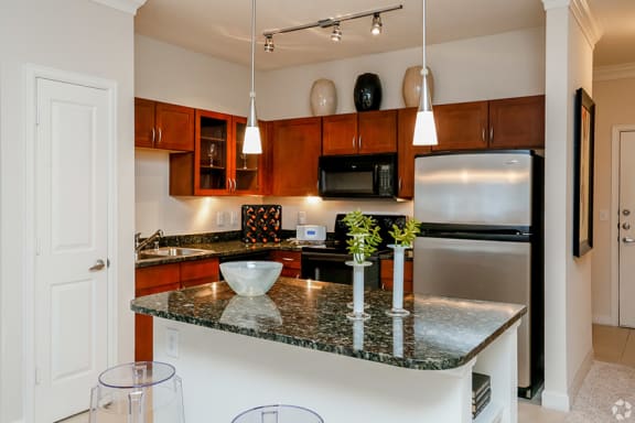 3000 Sage - Gourmet kitchen with modern fixtures and granite countertops