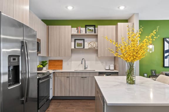 Chef-inspired Kitchen with Quart Countertops & Subway Tile Backsplash at Berkshire Winter Park, Winter Park, FL, 32789