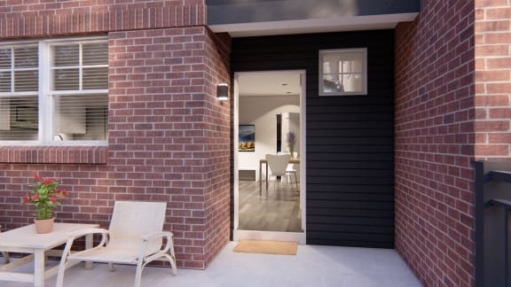 Entrance With Patio Entrance With Patio at Brownstones at Palisade Park Apartments, Chartered Holdings, Broomfield