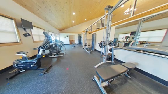 Fitness Center Equipped with Free Weights and Machines at Boulder Ridge Apartments