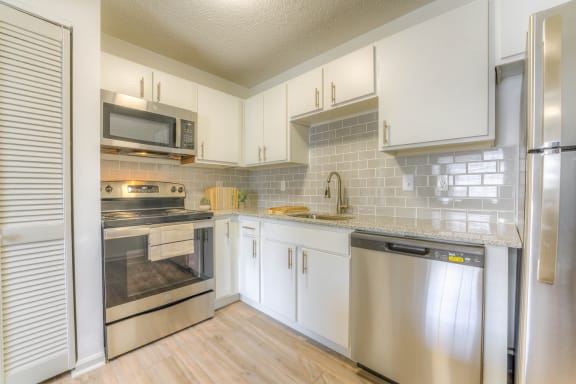 Beautifully renovated kitchen with new cabinets and stainless steel appliances