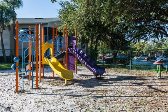 Thumbnail 17 of 20 - Fenced-In Playground at Winthrop West Apartment Homes, Riverview, FL