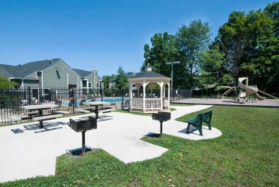 Garden Courtyard with Grills and Fireplace at The Crossings at White Marsh Apartments, Perry Hall, Maryland