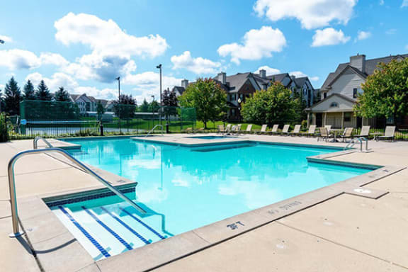 outdoor swimming pool at apartment complex