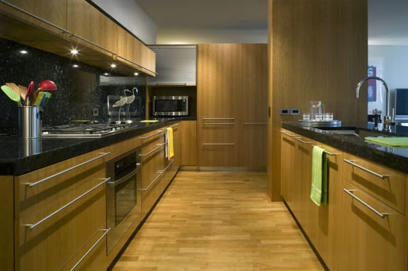 designer kitchens at Optima Old Orchard Woods Apartments in Skokie, IL