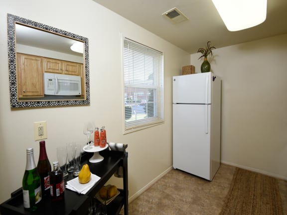 Bright, Eat-In Kitchen with Plenty of Cabinet Space at Colony Hill Apartments
