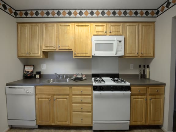 Eat in kitchens at Liberty Gardens Apartments with ample food storage space