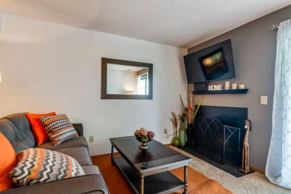 cozy fireplace at The Retreat at Woodridge apartments