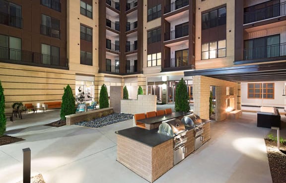 Outdoor Living Area including BBQ's and Fire Pits at The Edison Lofts Apartments, Raleigh