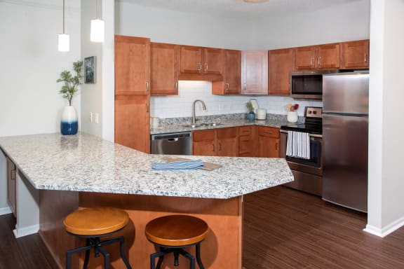 Large Kitchen with Cabinetry and Appliances at Waterstone Place, Minnetonka, MN, 55305