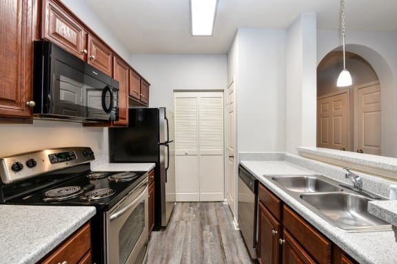 Spacious Kitchen With Pantry Cabinet at The Finley, Florida