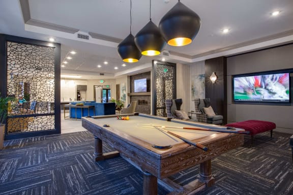 Clubroom with Kitchen and Fireplace at The Flats at Ballantyne Apartments, Charlotte, NC, 28277