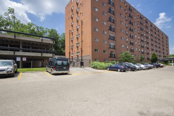 This is a photo of the building exterior showing the parking garage to Park Lane Apartments in Cincinnati, OH.