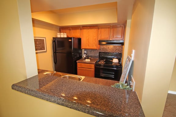 This is a photo of the breakfast bar of a 1018 square foot 2 bedroom apartment at Village East Apartments in Franklin, OH