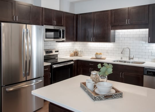 upgraded kitchens with breakfast bar in select townhomes