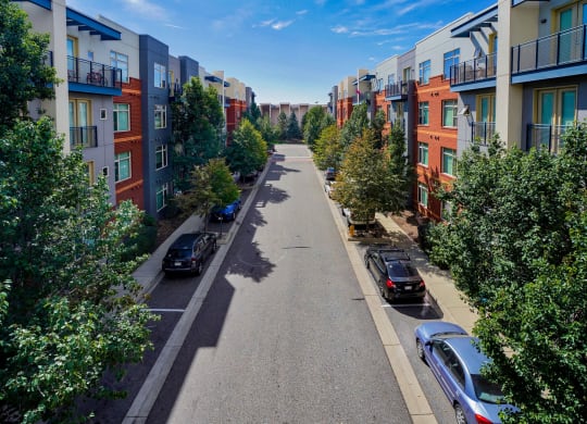 Landscaped street with parking at The District, CO, 80222