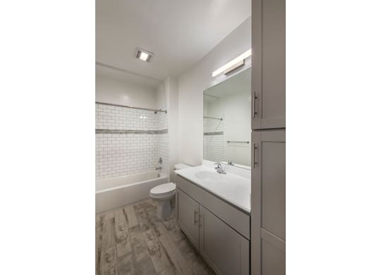 Bathroom with Vanity Lights at Apex Apartments, Arlington, 22206
