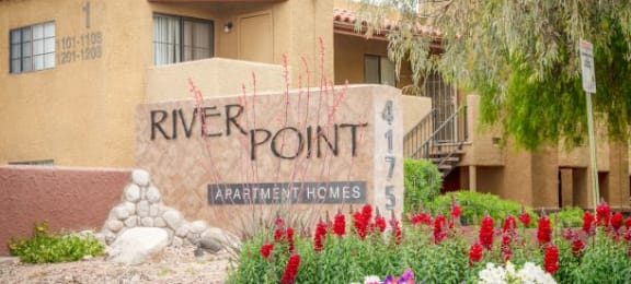 Decorated Entry Signage with Flowers at River Point Apartments, Tucson, AZ, 85712