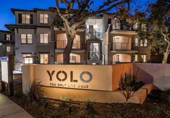 Yolo Apartments signage