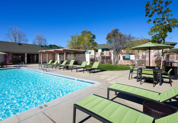 Lounging By The Pool at Knollwood Meadows Apartments, Santa Maria, CA, 93455