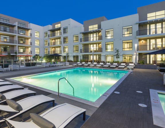 Pool with Lounge Chairs  l Revere Apartments in Campbell, CA 