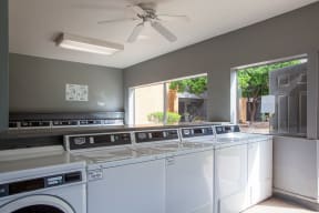 Community laundry facility at Casa Bella Apartments in Tucson AZ 4-2020