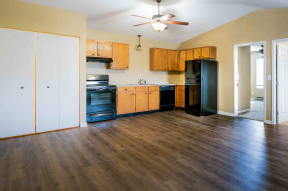 Murfreesboro TN Apartment Homes - Spacious Kitchen with Ample Storage and Black Appliances